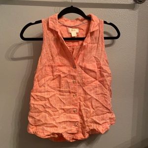 Short button down with white stitching.